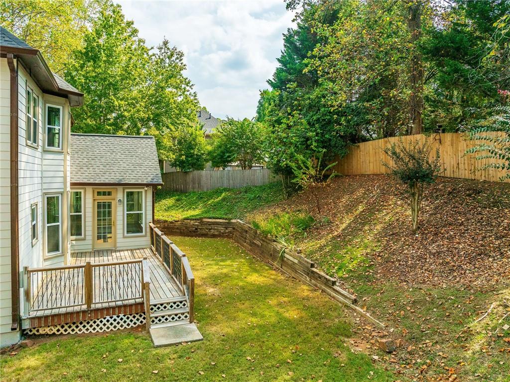 5719 Brookstone Walk Northwest Acworth, GA 30101 - Photo 46 of 54 a view of a house with pool and a yard