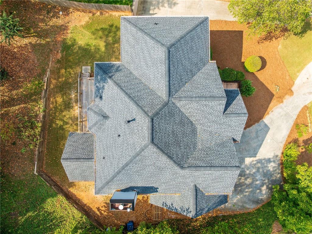 5719 Brookstone Walk Northwest Acworth, GA 30101 - Photo 47 of 54 an aerial view of a house with swimming pool and wooden fence