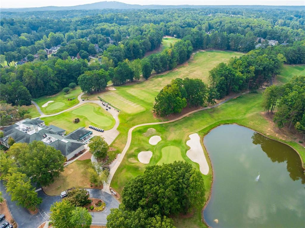 5719 Brookstone Walk Northwest Acworth, GA 30101 - Photo 50 of 54 an aerial view of a swimming pool with a yard and large trees