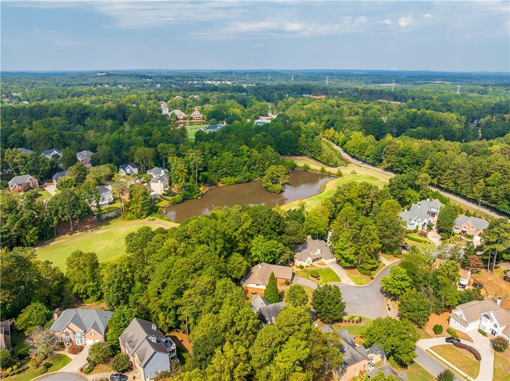 5719 Brookstone Walk Northwest Acworth, GA 30101 - Photo 54 of 54 a view of a lake with mountains in background