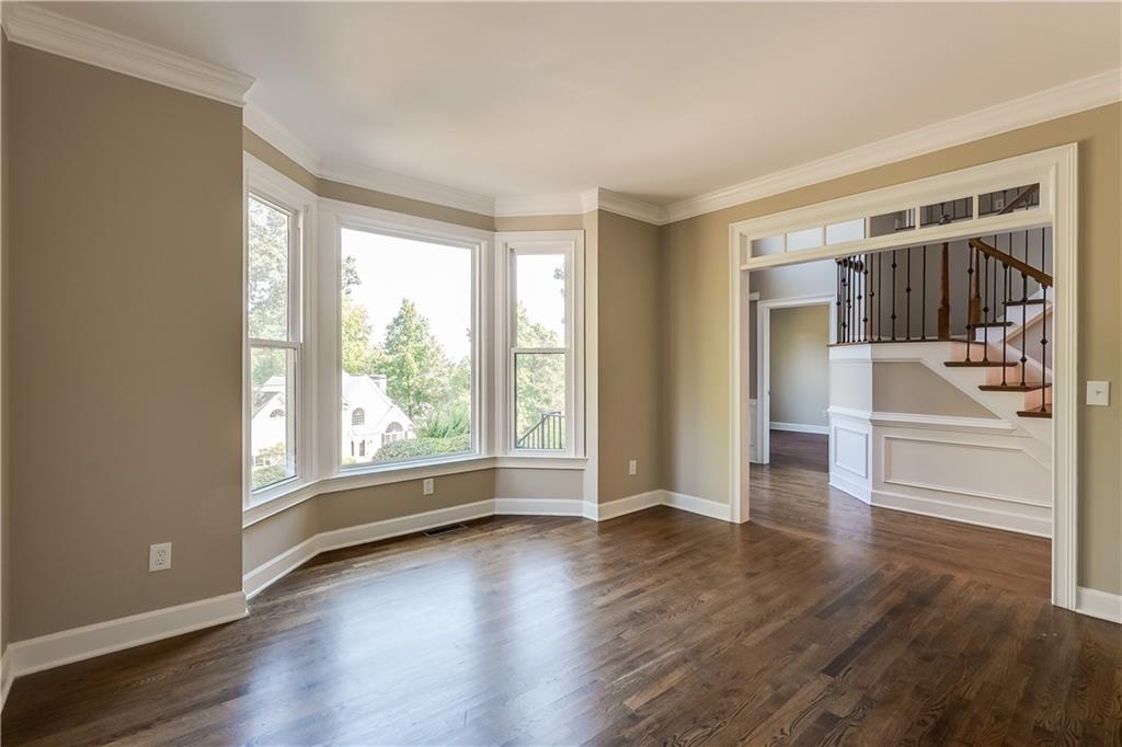 5719 Brookstone Walk Northwest Acworth, GA 30101 - Photo 6 of 54 wooden floor in an empty room with a window