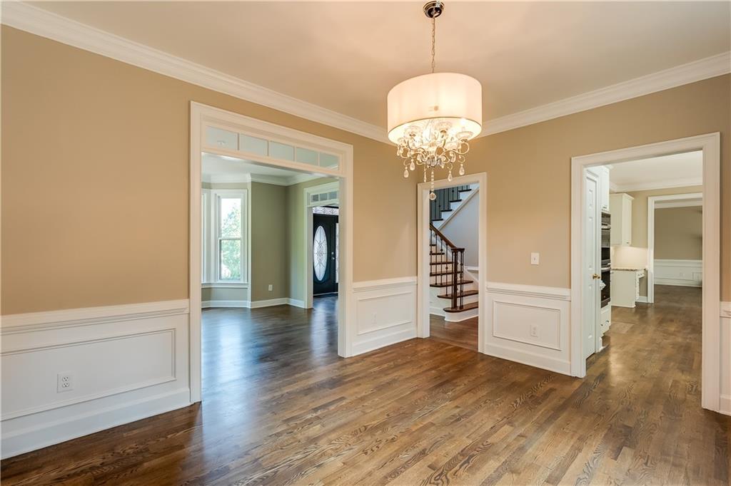 5719 Brookstone Walk Northwest Acworth, GA 30101 - Photo 8 of 54 a view of a livingroom with wooden floor and stairs