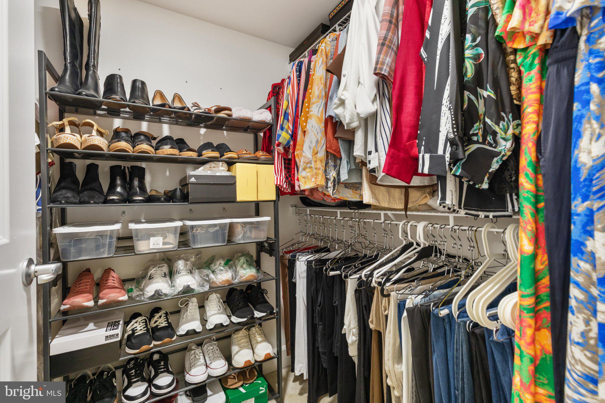 11800 Sunset Hills Road, Unit 815 Reston, VA 20190 - Photo 16 of 61 Walk-In Closet of Primary Suite