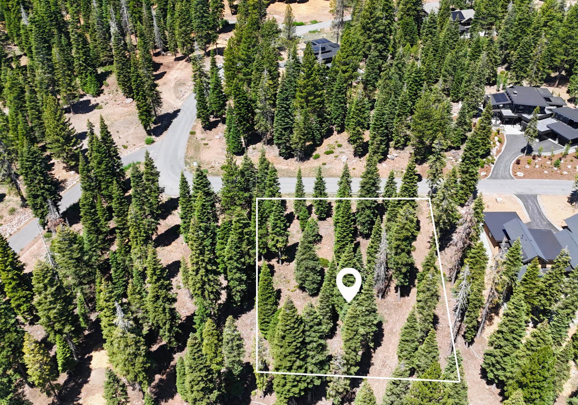 9188 Tarn Circle Truckee, CA 96161 - Photo 3 of 13 an aerial view of a house with a yard