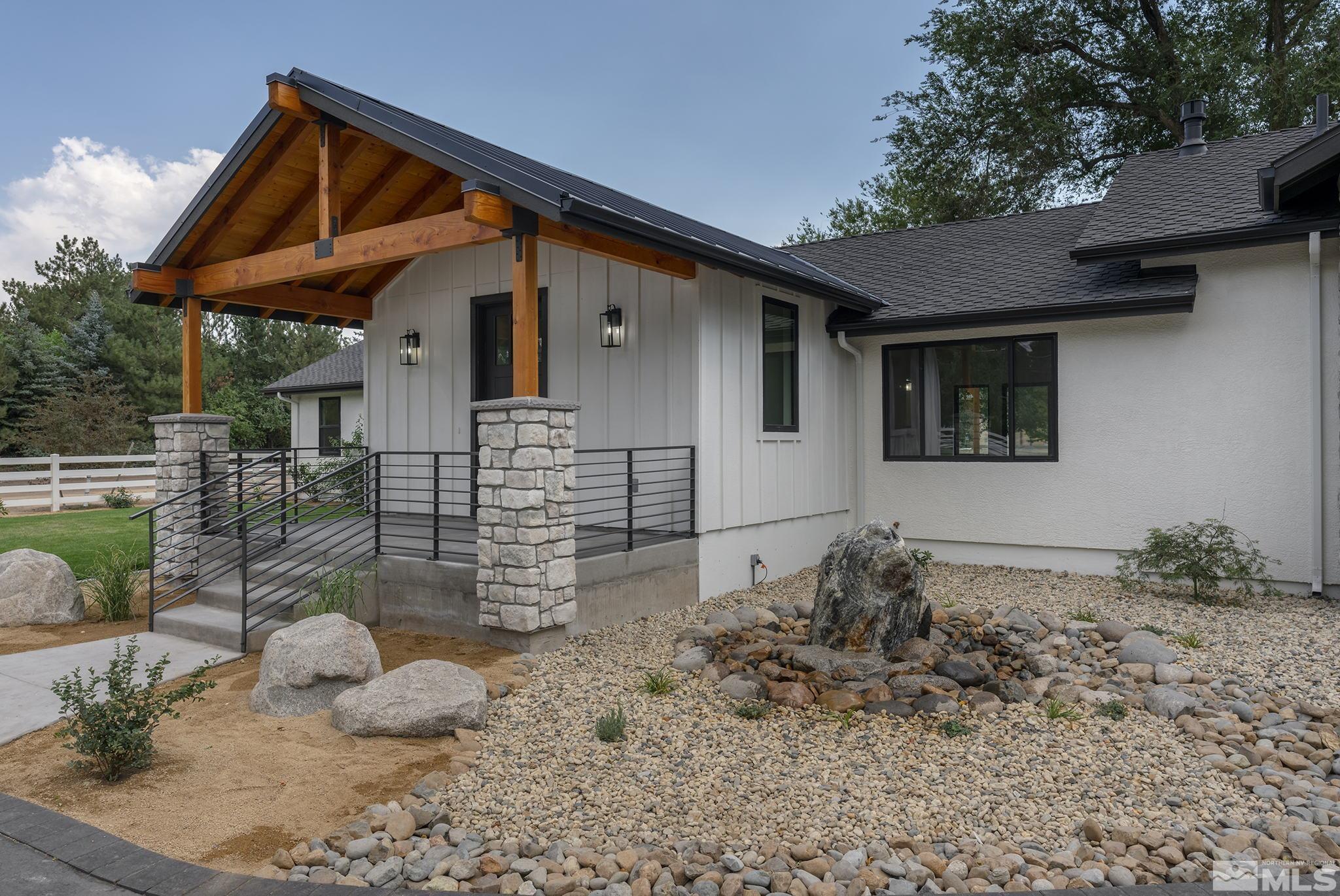 2250 Holcomb Ranch Lane Reno, NV 89511 - Photo 3 of 40 a backyard of a house with plants and outdoor seating