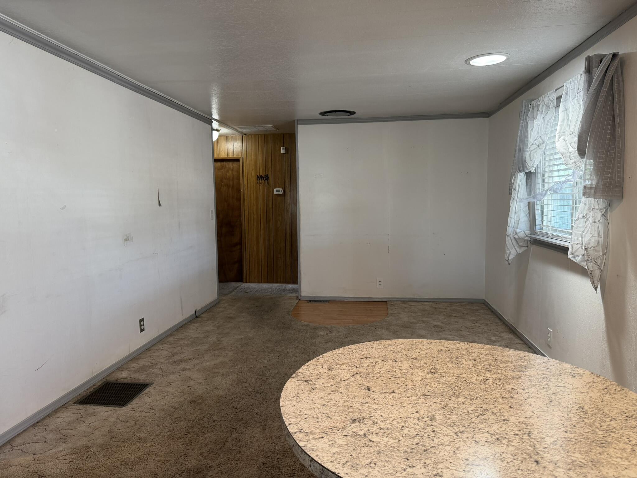 301 Freeman Road, Unit 70 Central Point, OR 97502 - Photo 23 of 39 an empty room with windows