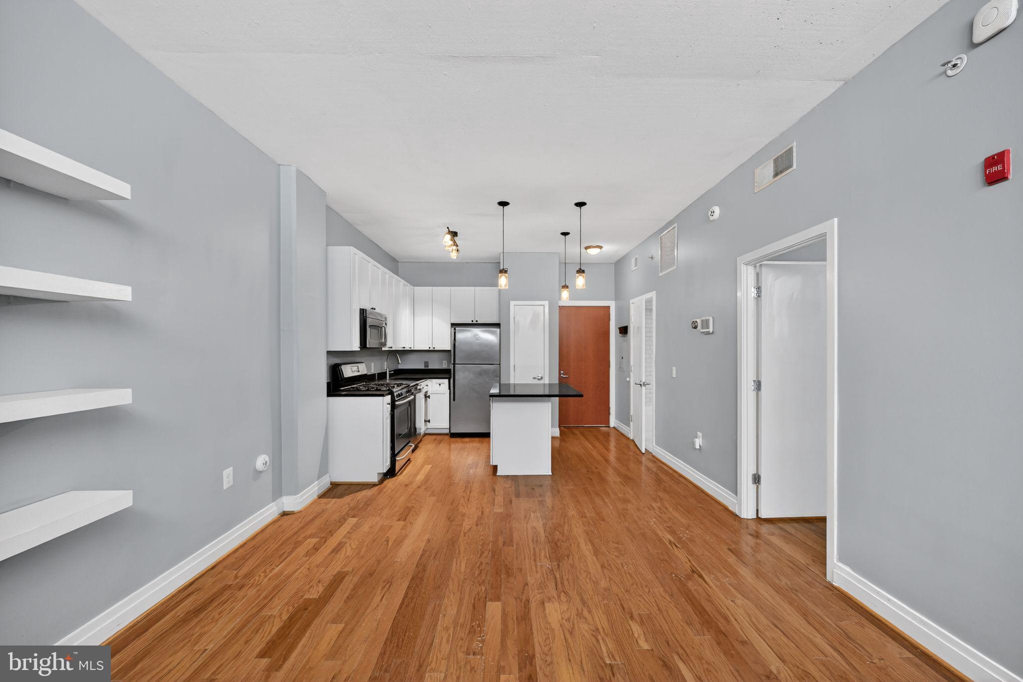 2120 Vermont Avenue Northwest, Unit 4 Washington, DC 20001 - Photo 2 of 24 a view of kitchen with sink and refrigerator