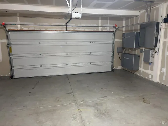 a view of a refrigerator in a kitchen