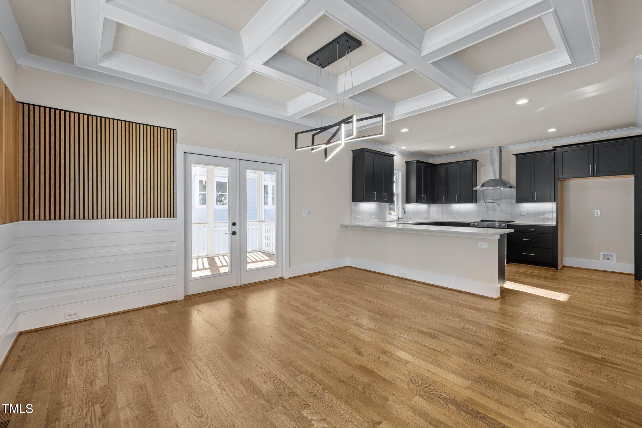 600 Bragg Street Raleigh, NC 27610 - Photo 13 of 68 a view of kitchen with wooden floor