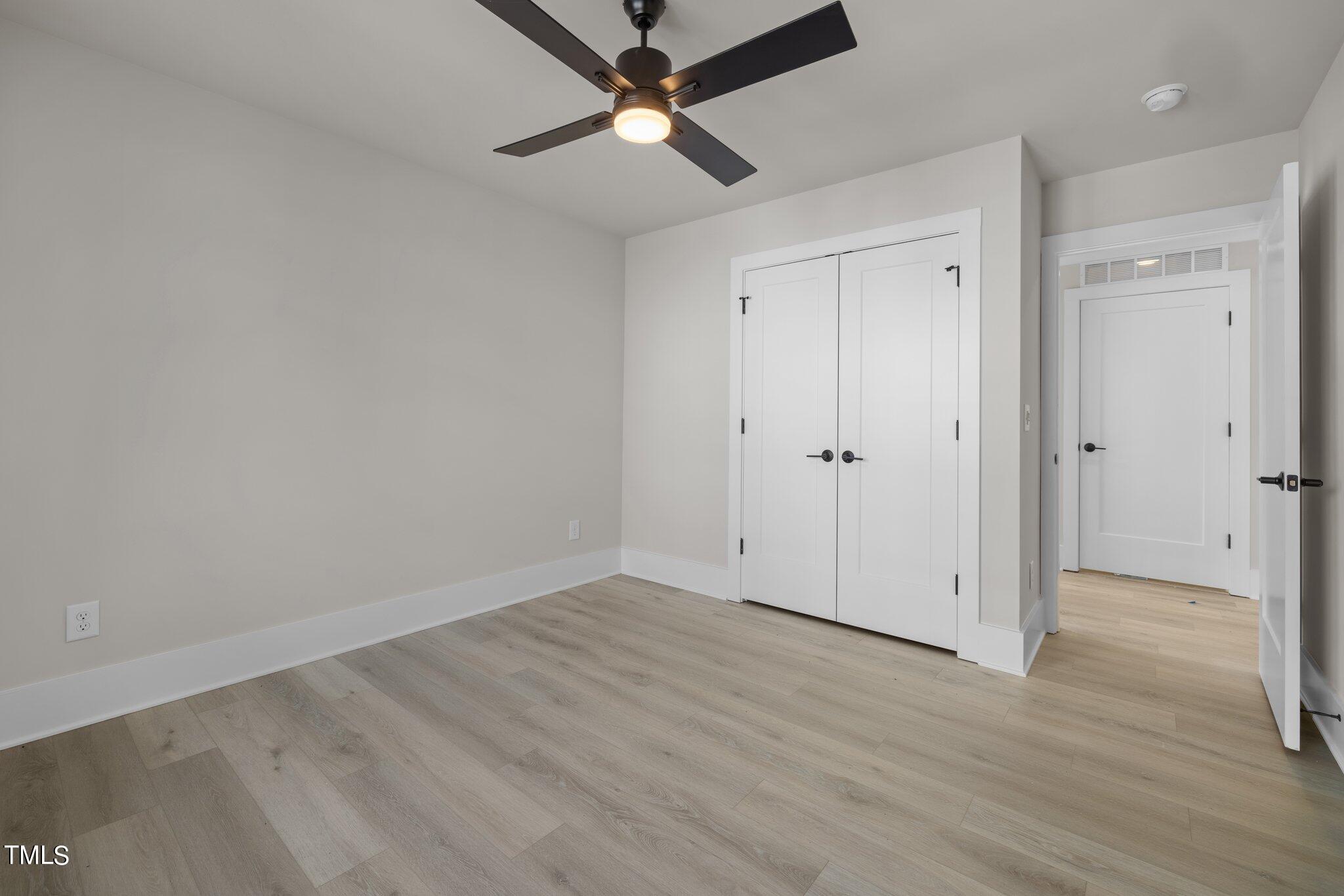 600 Bragg Street Raleigh, NC 27610 - Photo 49 of 68 wooden floor in an empty room