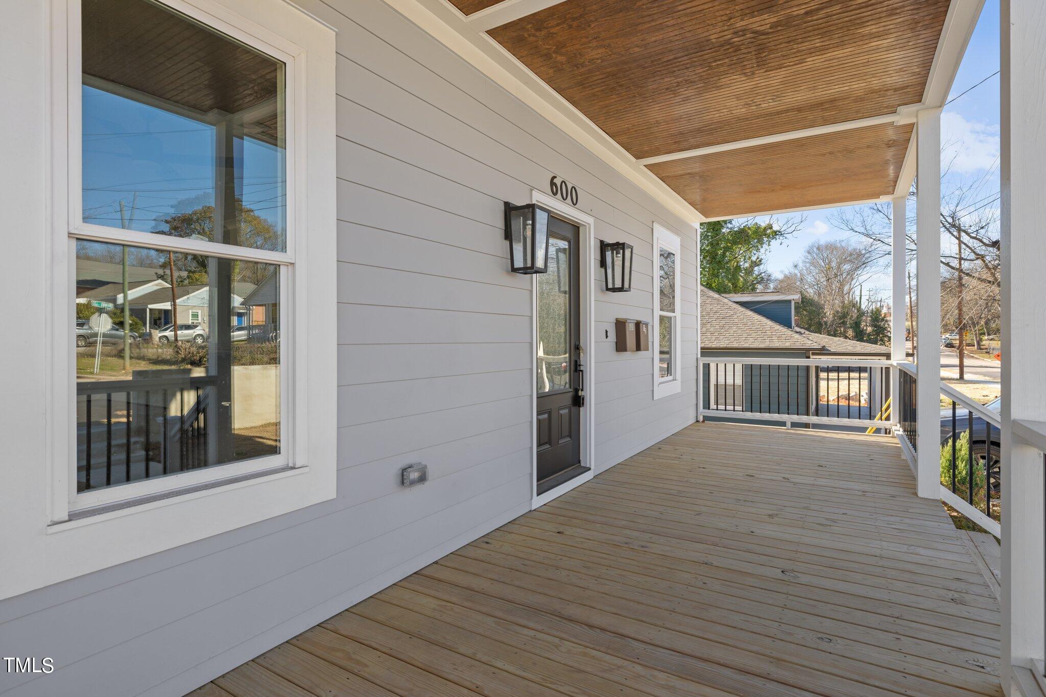 600 Bragg Street Raleigh, NC 27610 - Photo 5 of 68 a view of a house with a deck