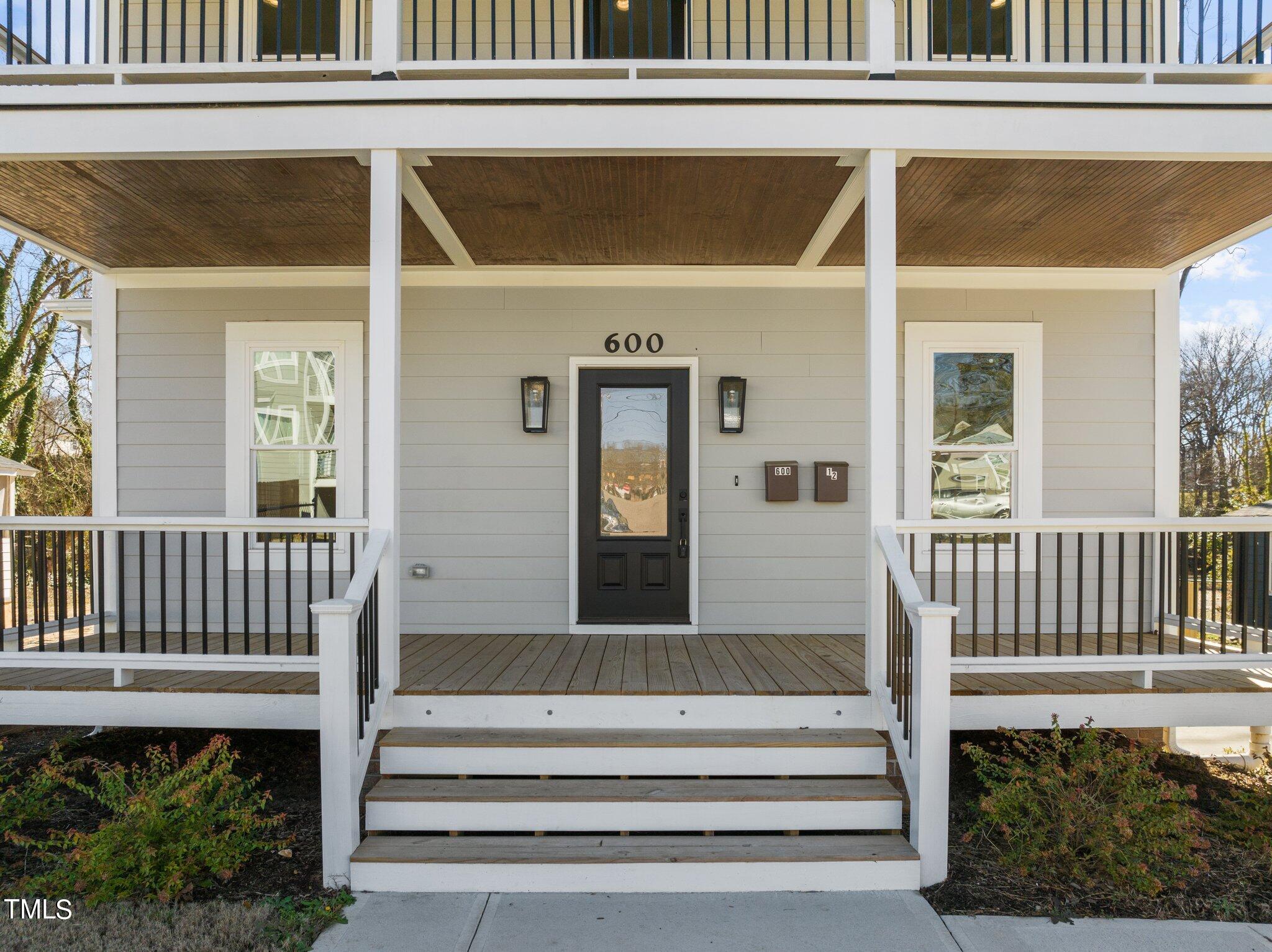 600 Bragg Street Raleigh, NC 27610 - Photo 59 of 68 a view of front door of house with deck