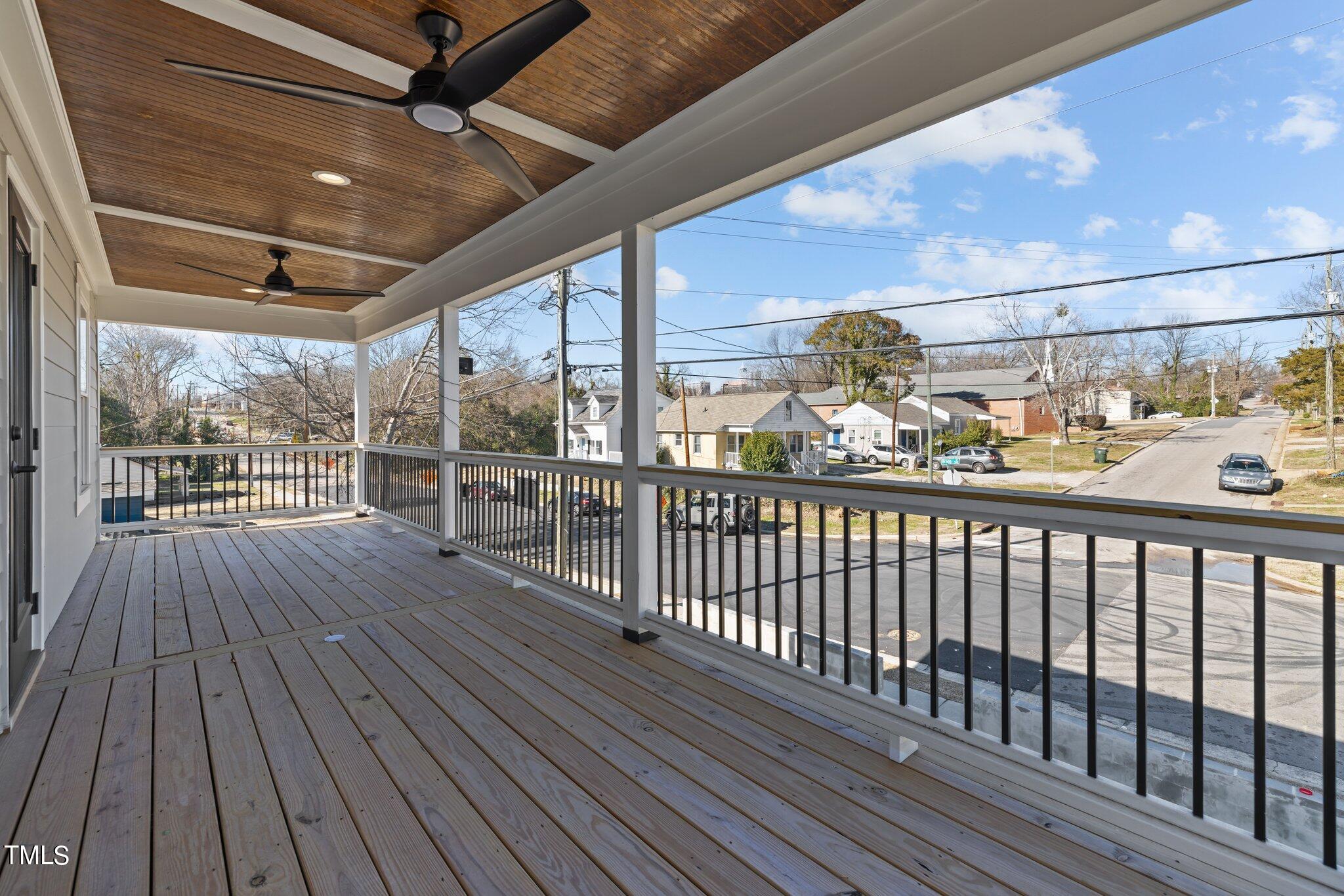 600 Bragg Street Raleigh, NC 27610 - Photo 6 of 68 a view of a balcony with wooden floor