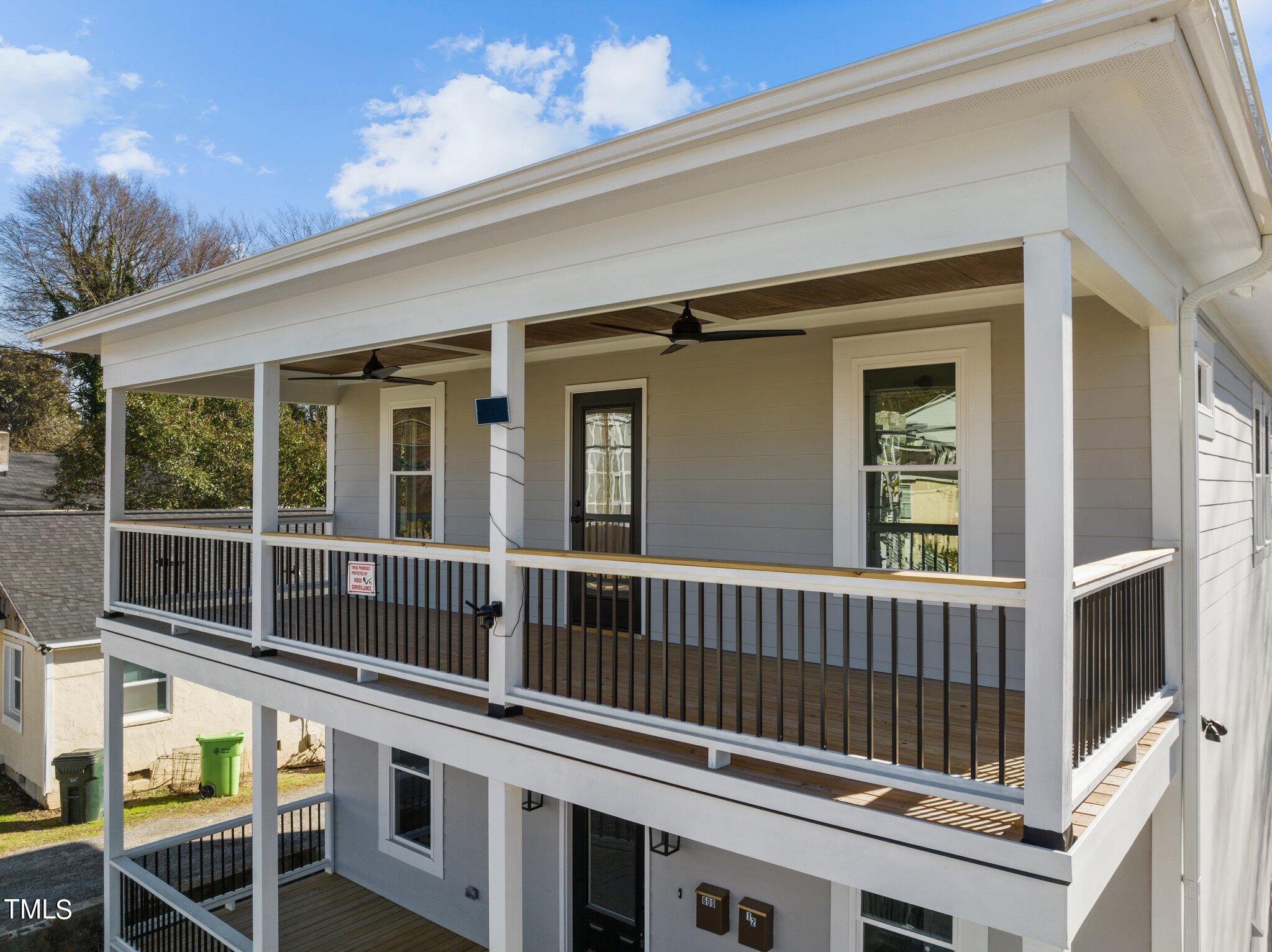 600 Bragg Street Raleigh, NC 27610 - Photo 62 of 68 a view of a house with deck and deck