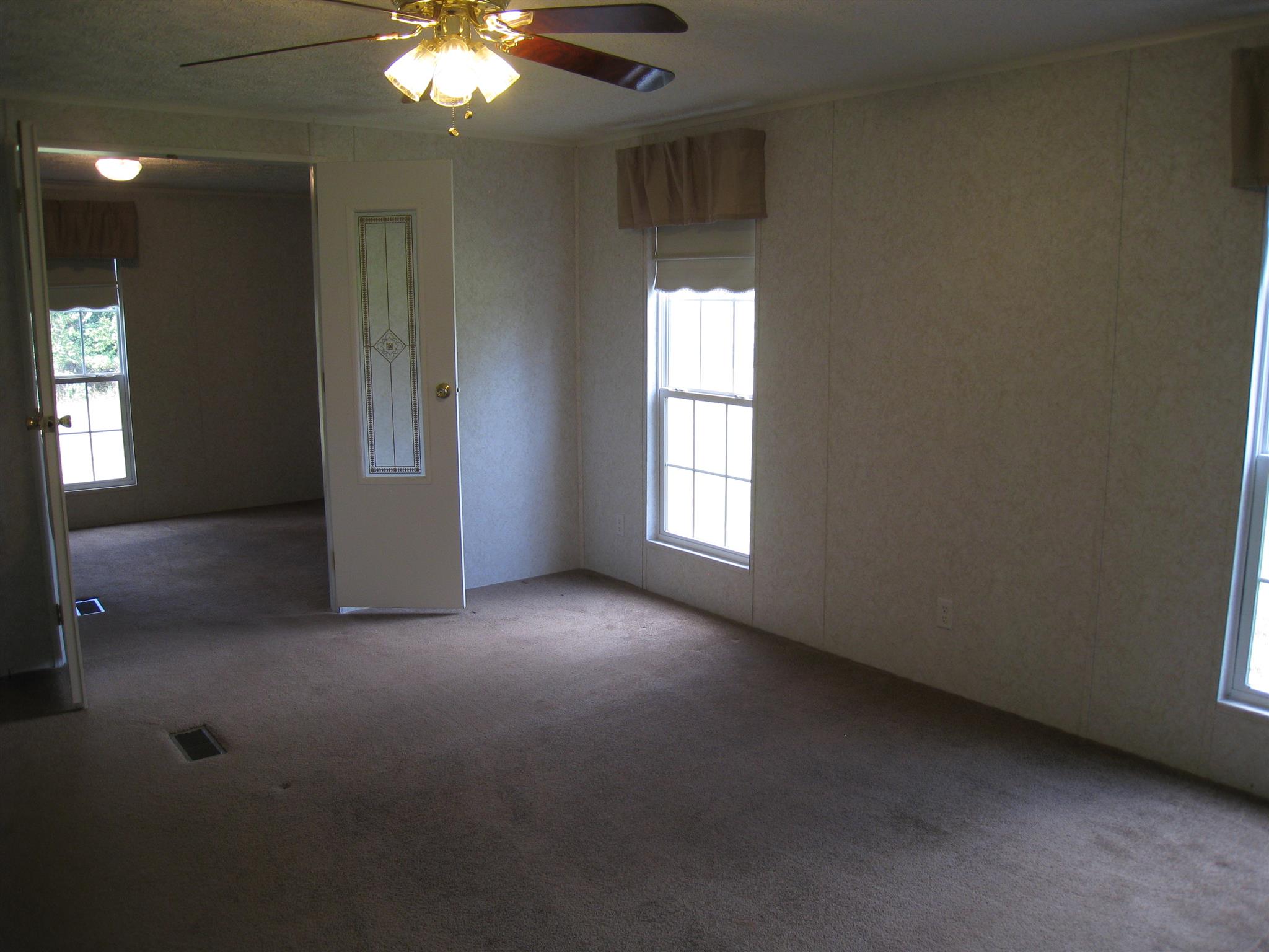 110 Snider Perry Road Portland, TN 37148 - Photo 17 of 24 a view of a livingroom with a ceiling fan and window