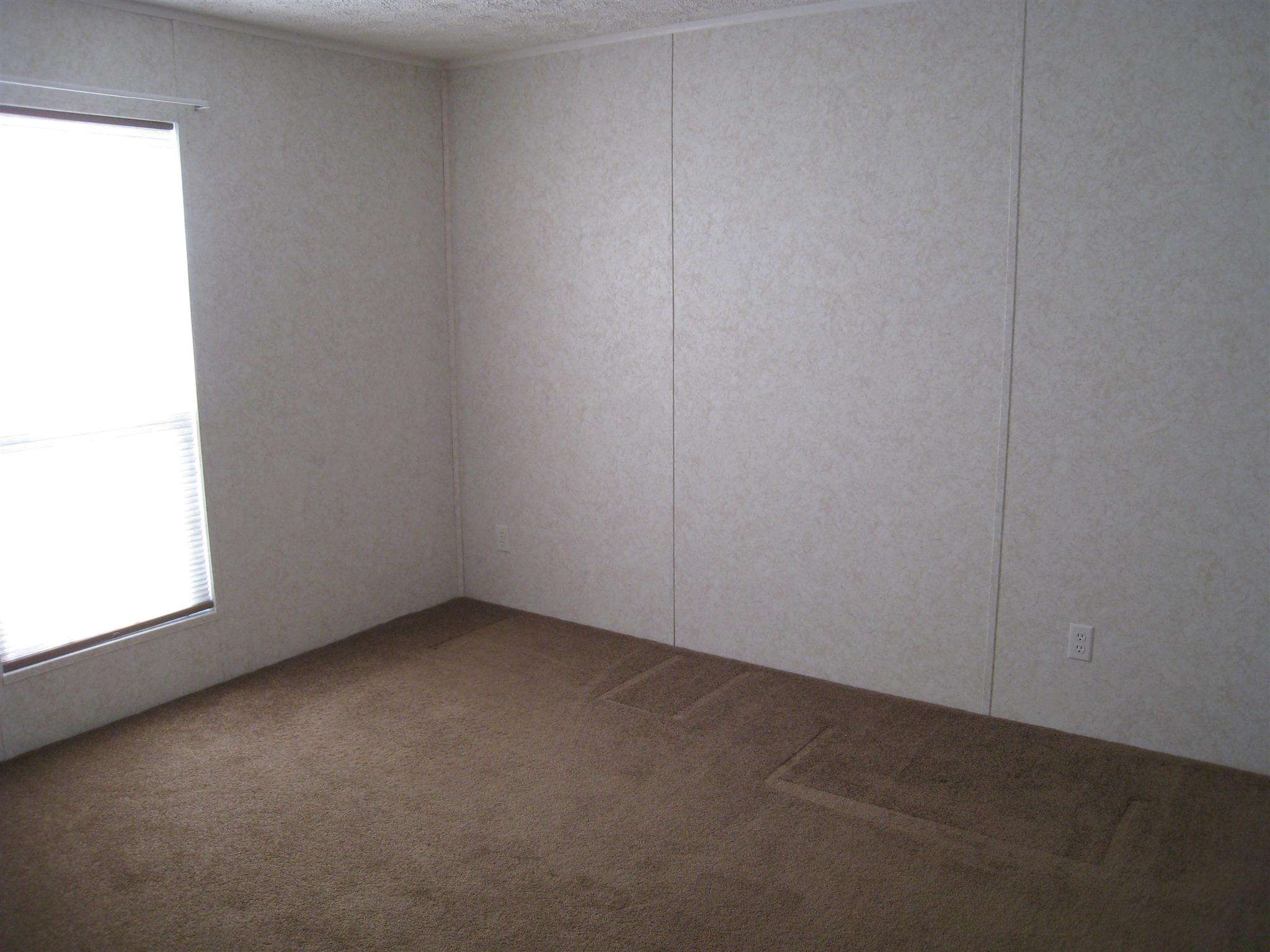 110 Snider Perry Road Portland, TN 37148 - Photo 22 of 24 a view of an empty room and a window