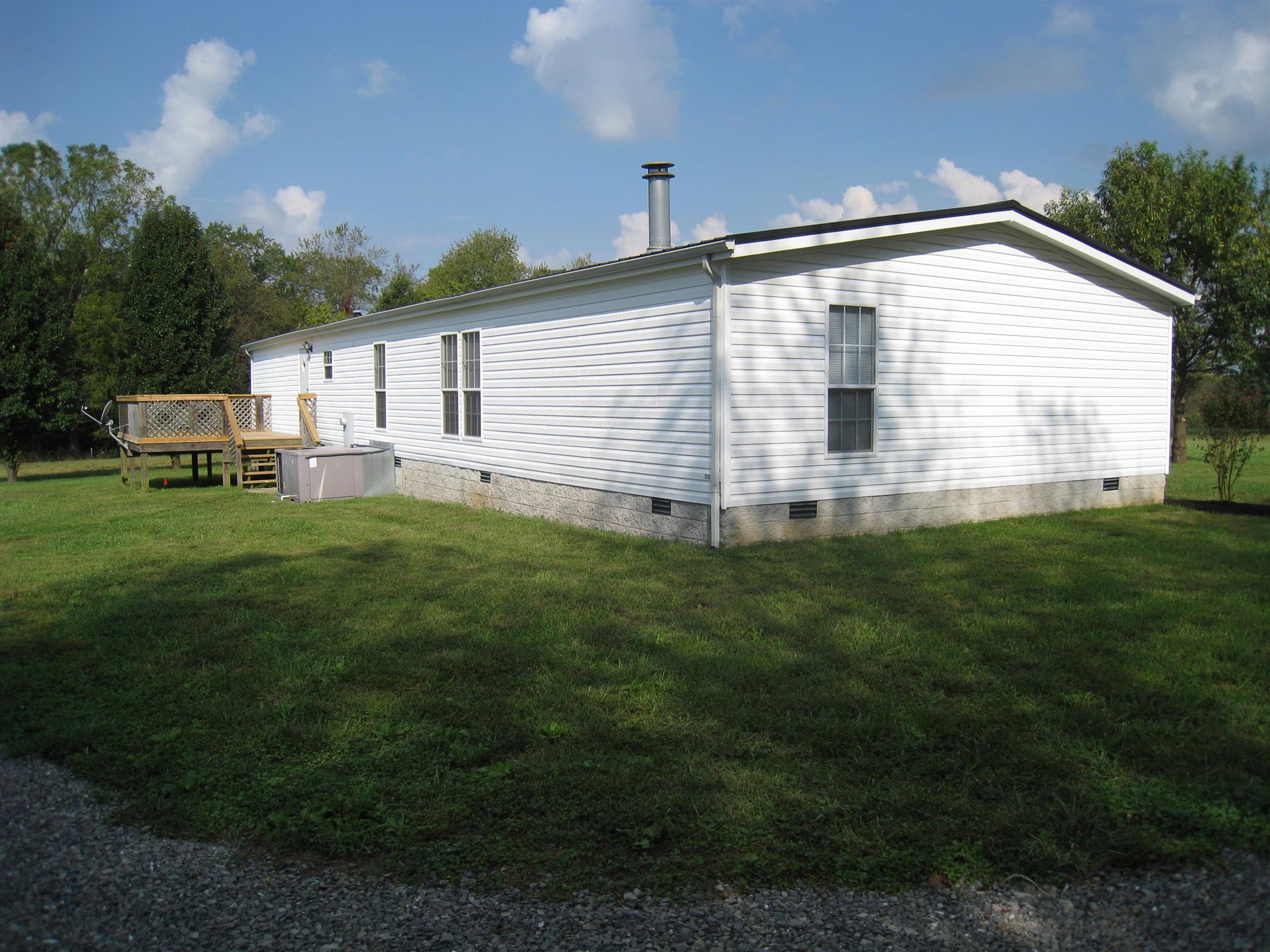 110 Snider Perry Road Portland, TN 37148 - Photo 5 of 24 a view of a house with a yard and sitting area