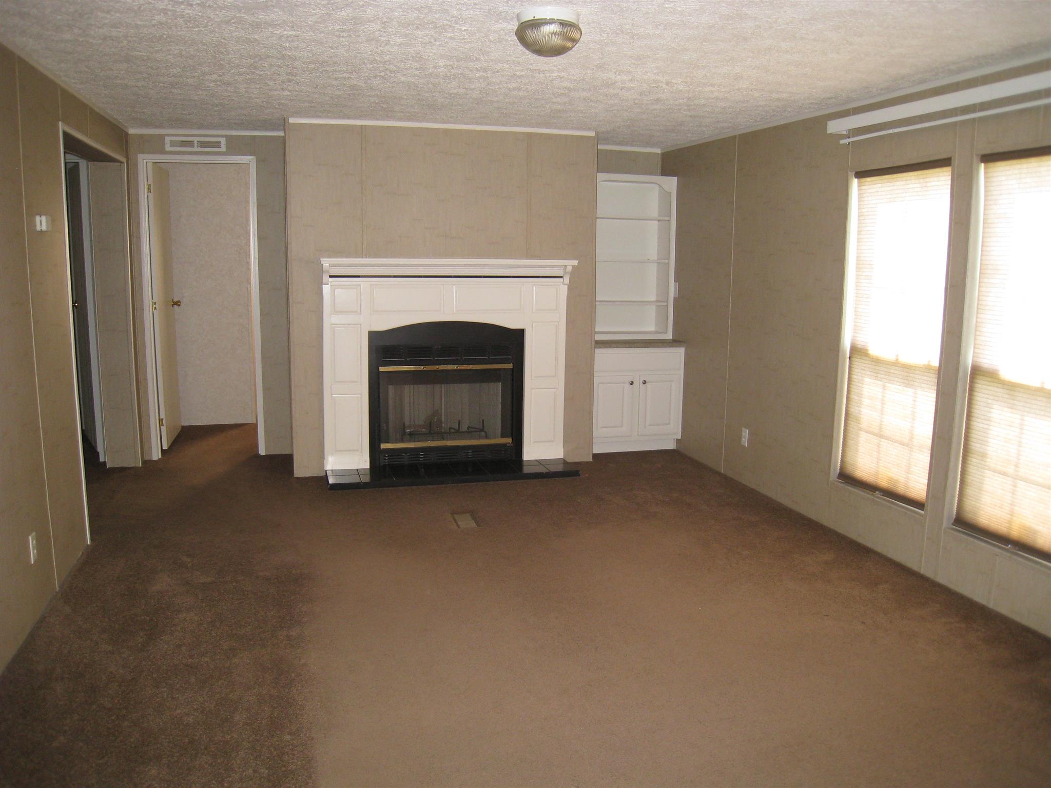 110 Snider Perry Road Portland, TN 37148 - Photo 9 of 24 a view of a livingroom with a fireplace