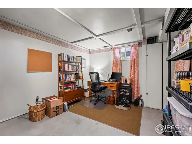 a living room with furniture window and a flat screen tv