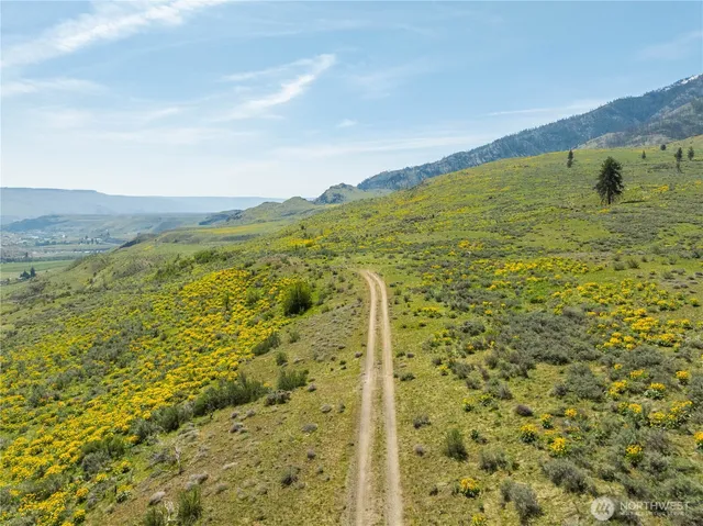 a view of ocean with mountains