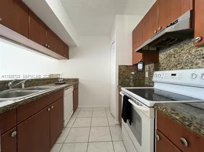 a utility room with washer and dryer