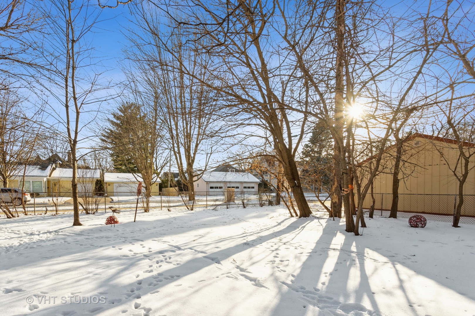 329 East 8th Avenue Naperville, IL 60563 - Photo 11 of 15 a street view covered with snow