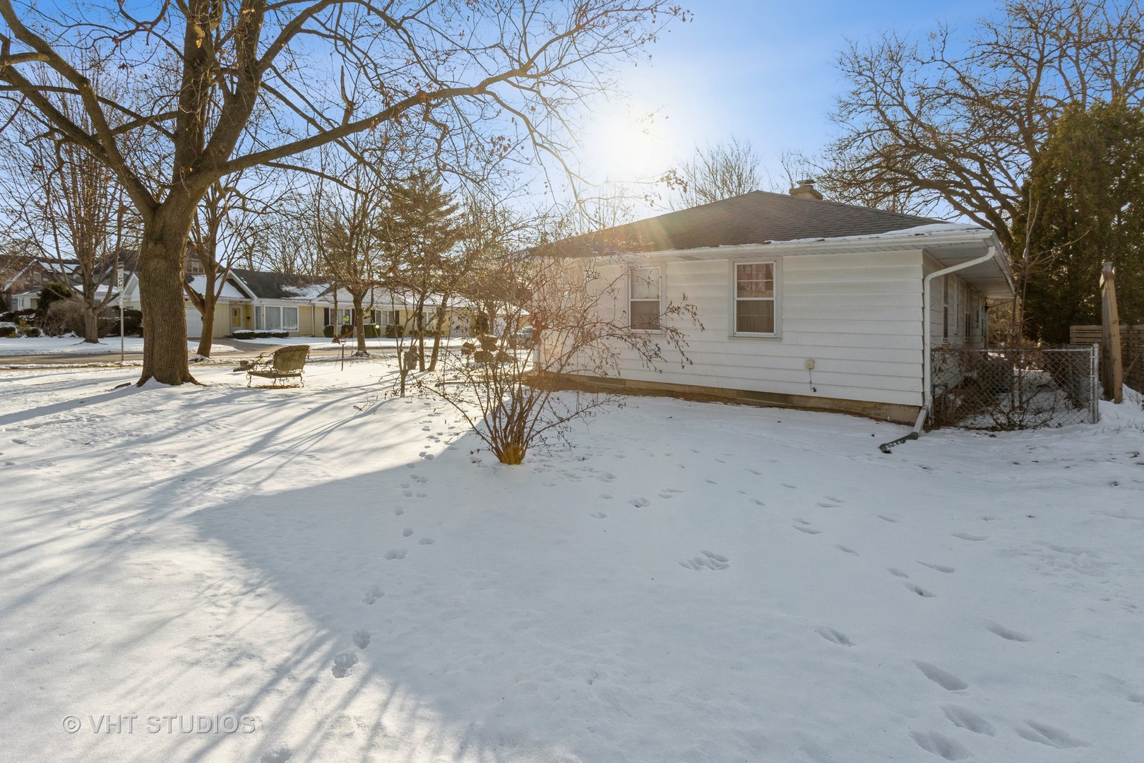 329 East 8th Avenue Naperville, IL 60563 - Photo 5 of 15 a view of a house with a snow