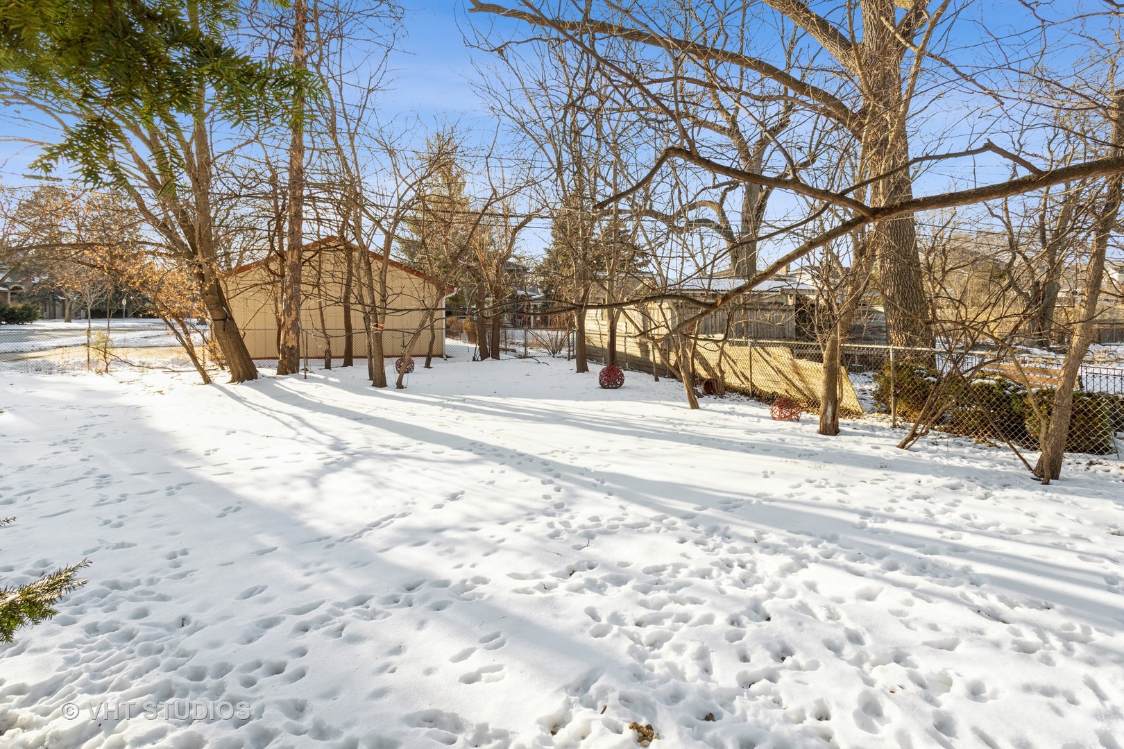 329 East 8th Avenue Naperville, IL 60563 - Photo 9 of 15 a view of road with covered with snow