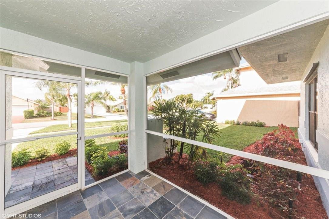 22494 Grouper Court Boca Raton, FL 33428 - Photo 3 of 22 a view of a glass door