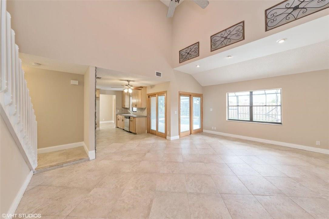 22494 Grouper Court Boca Raton, FL 33428 - Photo 9 of 22 a view of an empty room with a window