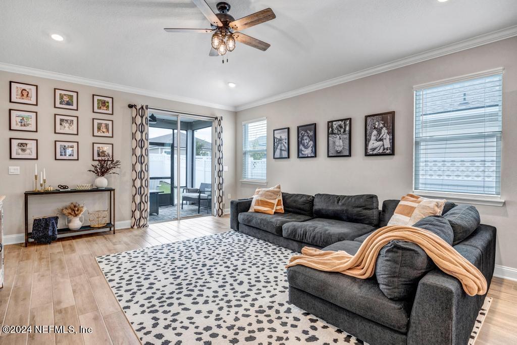 196 Creekmore Drive St. Augustine, FL 32092 - Photo 16 of 51 a living room with furniture and a couch