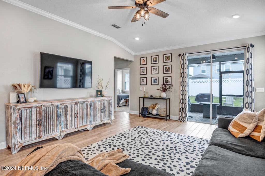 196 Creekmore Drive St. Augustine, FL 32092 - Photo 18 of 51 a bedroom with furniture and a window