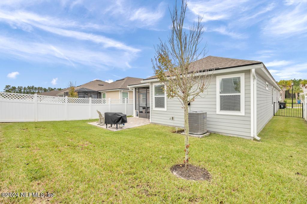 196 Creekmore Drive St. Augustine, FL 32092 - Photo 39 of 51 a house view with swimming pool and porch