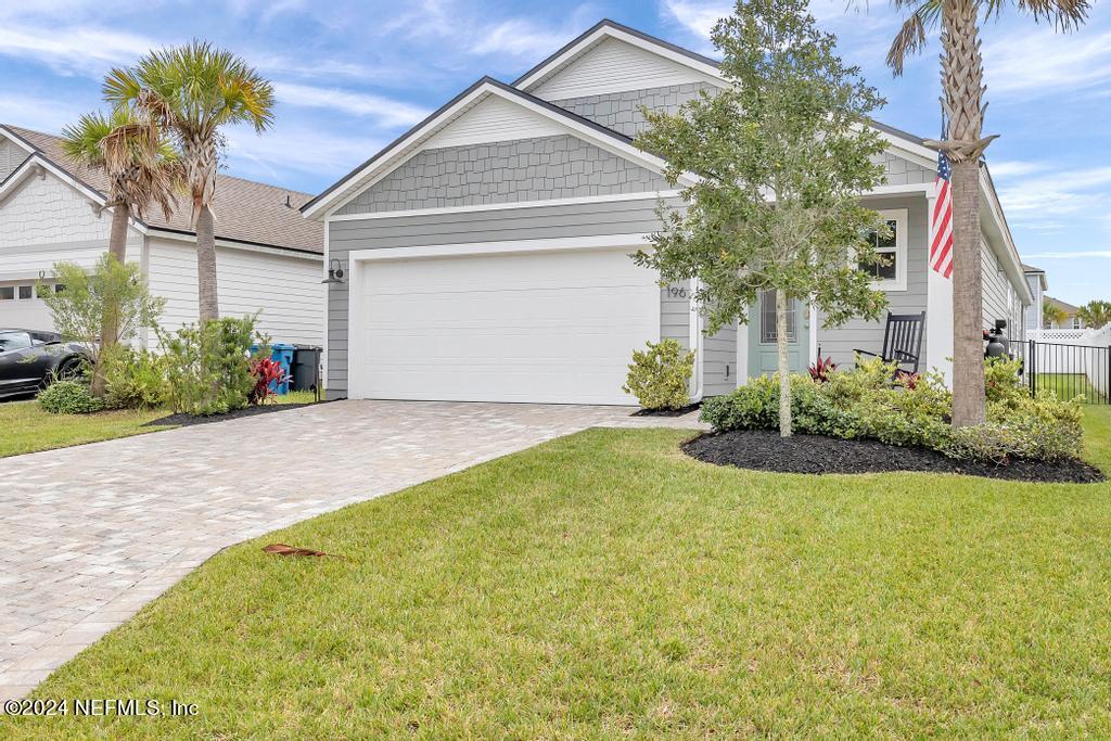 196 Creekmore Drive St. Augustine, FL 32092 - Photo 51 of 51 a front view of a house with garden