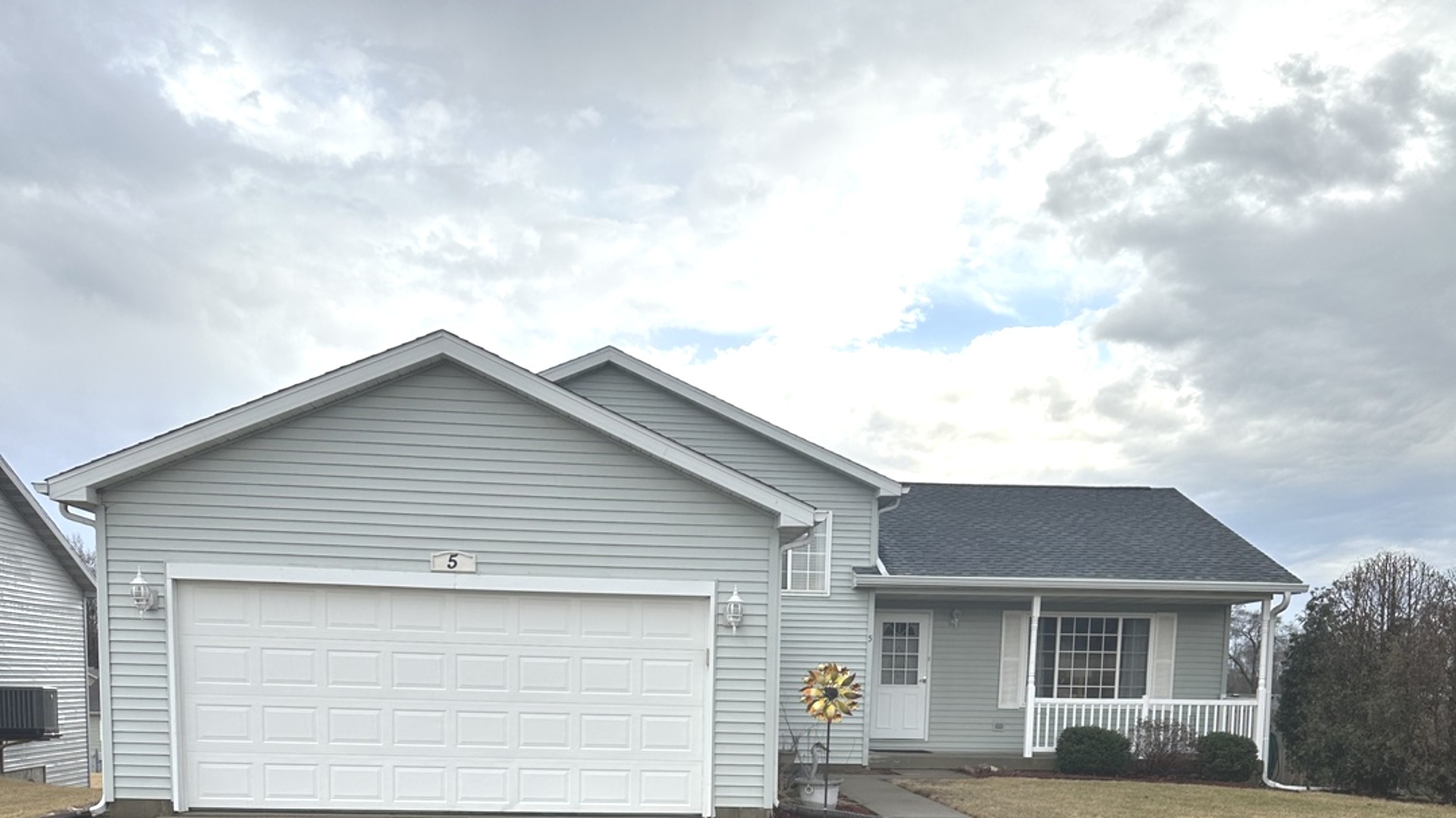 5 Emily Drive Spring Valley, IL 61362 - Photo 2 of 21 a front view of a house with a garage