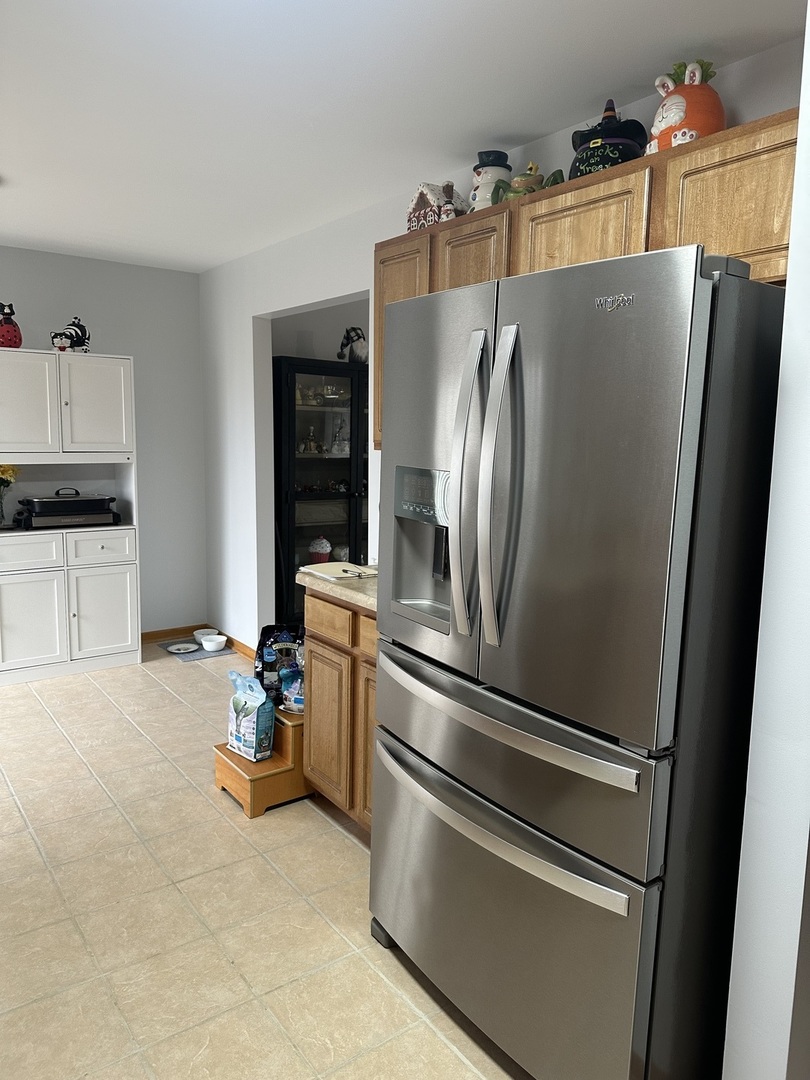 5 Emily Drive Spring Valley, IL 61362 - Photo 7 of 21 a metallic refrigerator freezer sitting in a kitchen