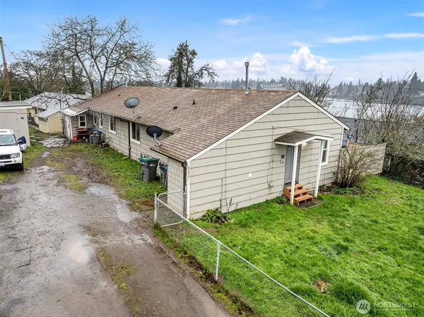 a aerial view of a house with a yard