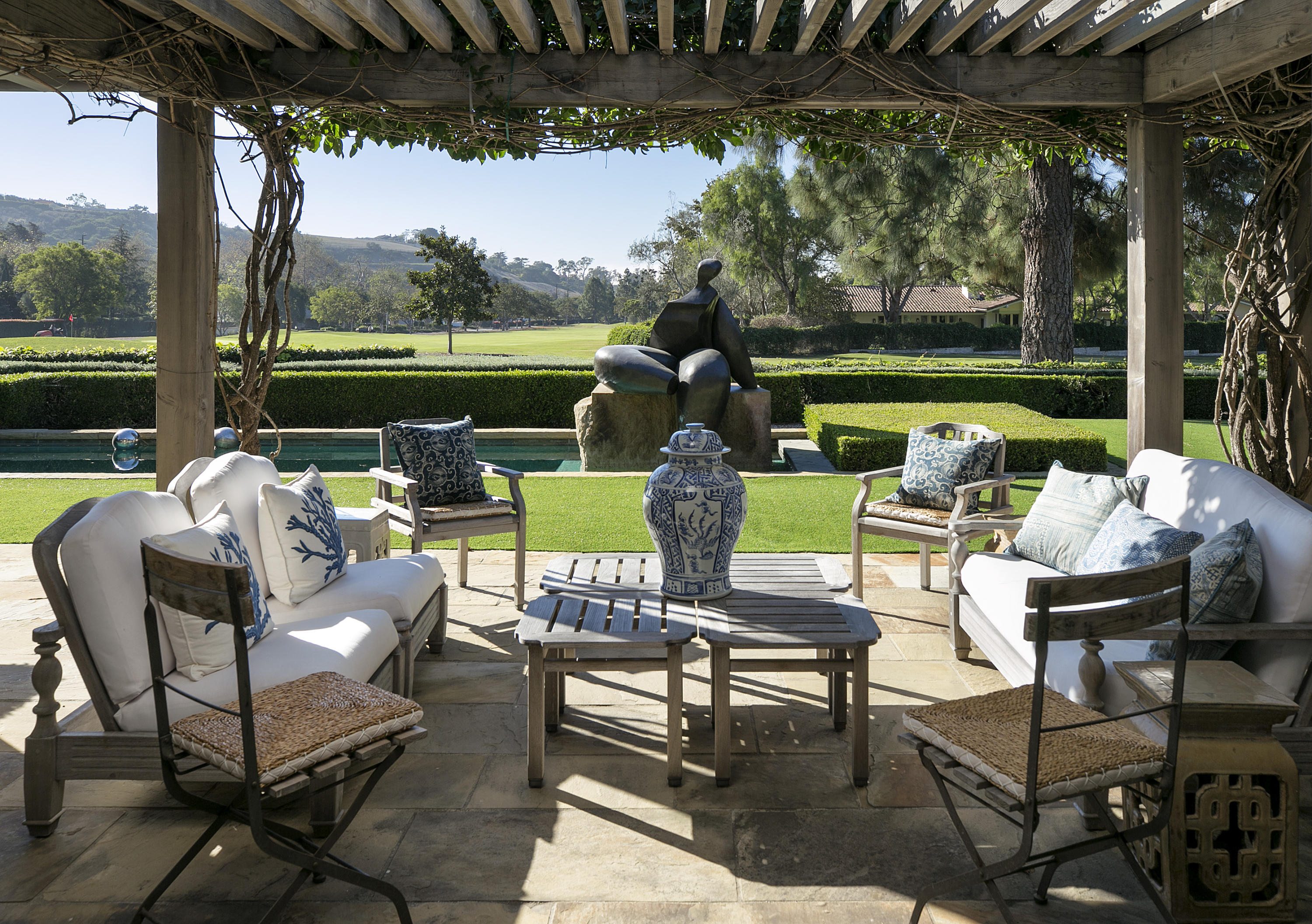 a garden view with a seating space