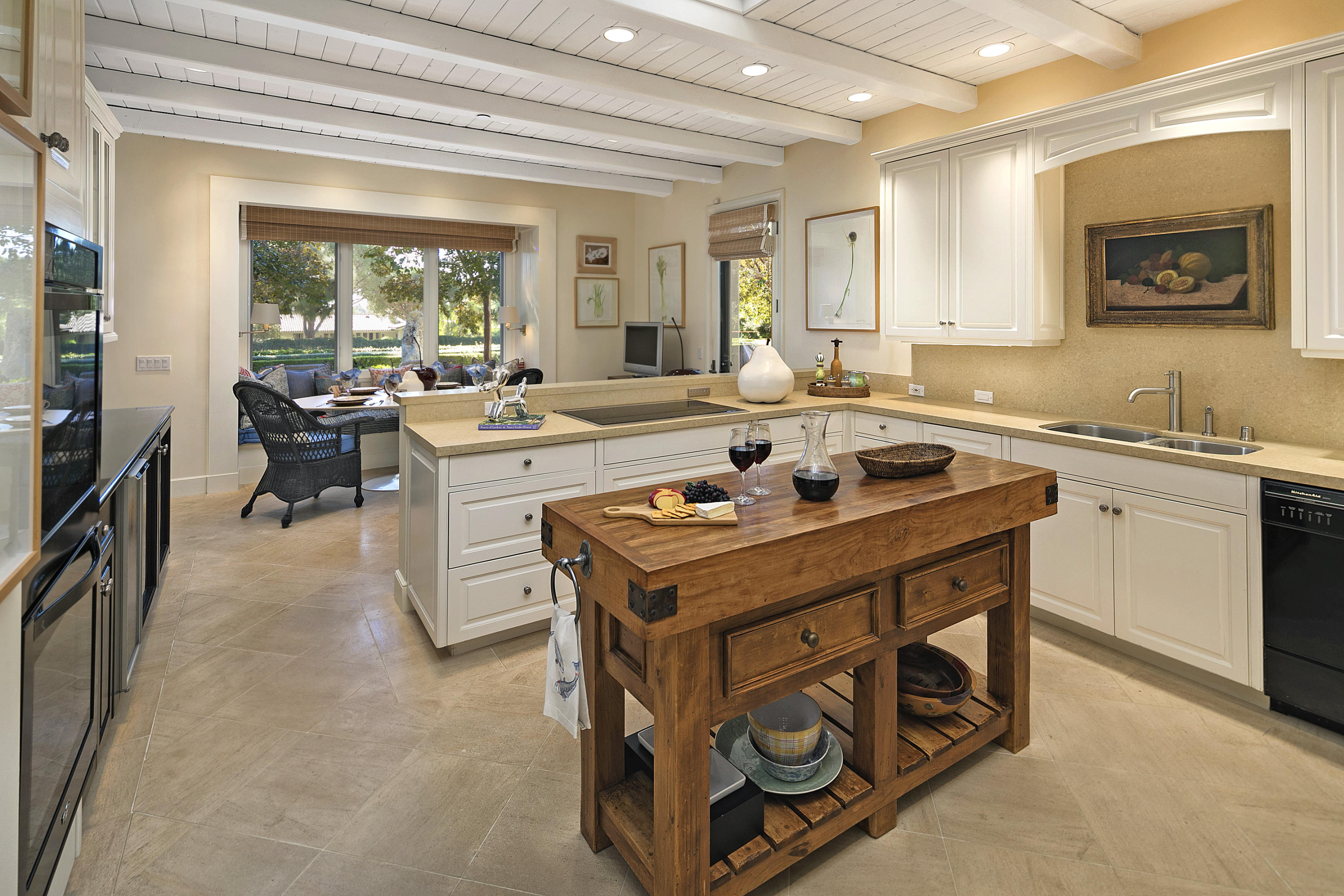 2159 Boundary Drive Montecito, CA 93108 - Photo 12 of 14 a kitchen with a stove a sink a counter top space and furniture