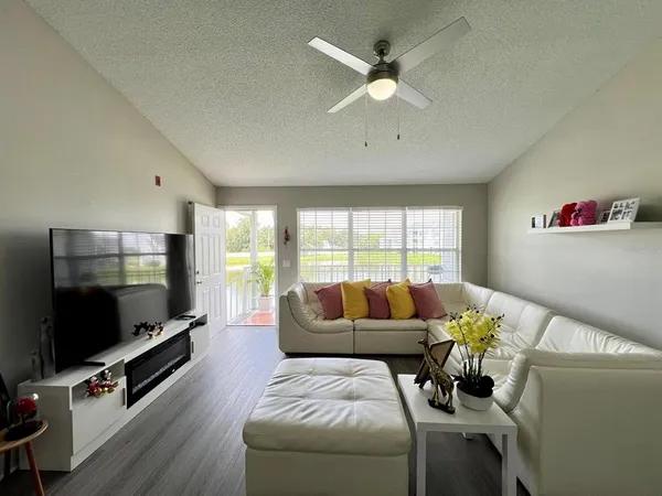 a kitchen with stainless steel appliances a sink stove and refrigerator