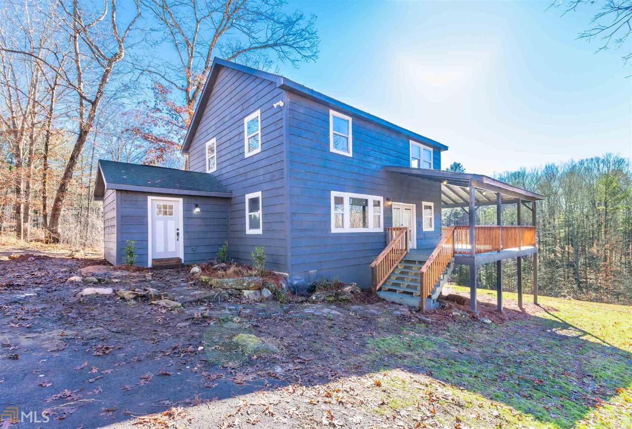 300 Chuckwagon Road Demorest, GA 30535 - Photo 1 of 1 a view of a house with a yard and sitting area
