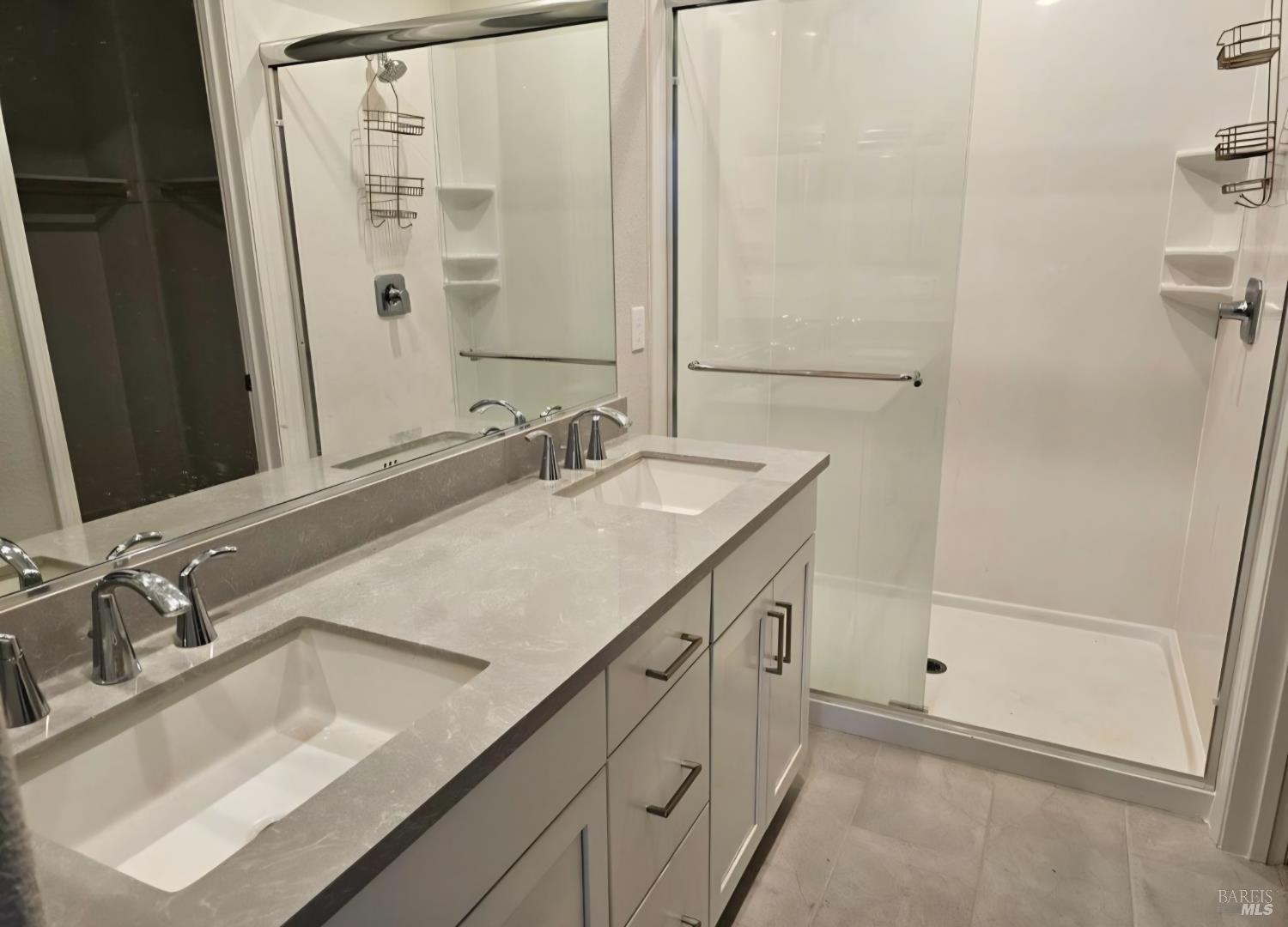 312 Pear Tree Lane, Unit E Napa, CA 94558 - Photo 4 of 5 a bathroom with a sink and a mirror