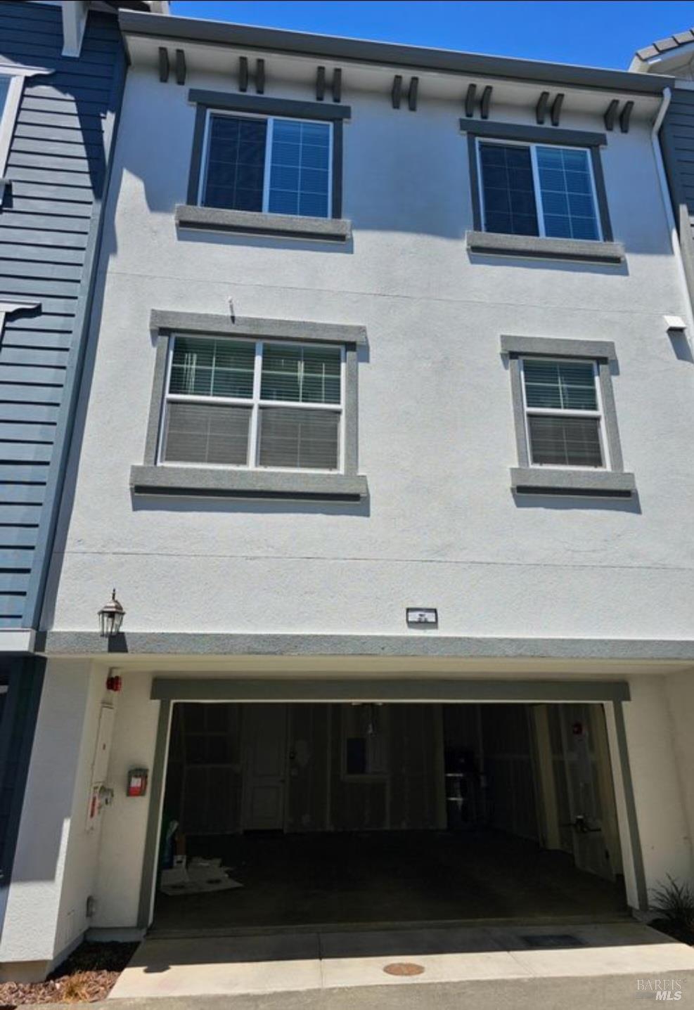 312 Pear Tree Lane, Unit E Napa, CA 94558 - Photo 5 of 5 a view of a house with car parked