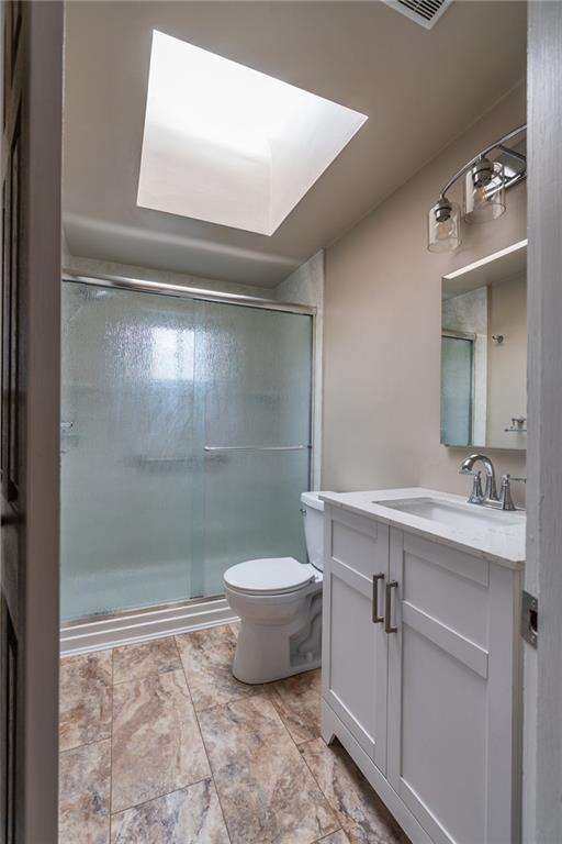 562 Filmore Road Pittsburgh, PA 15221 - Photo 18 of 25 a bathroom with a sink mirror toilet and