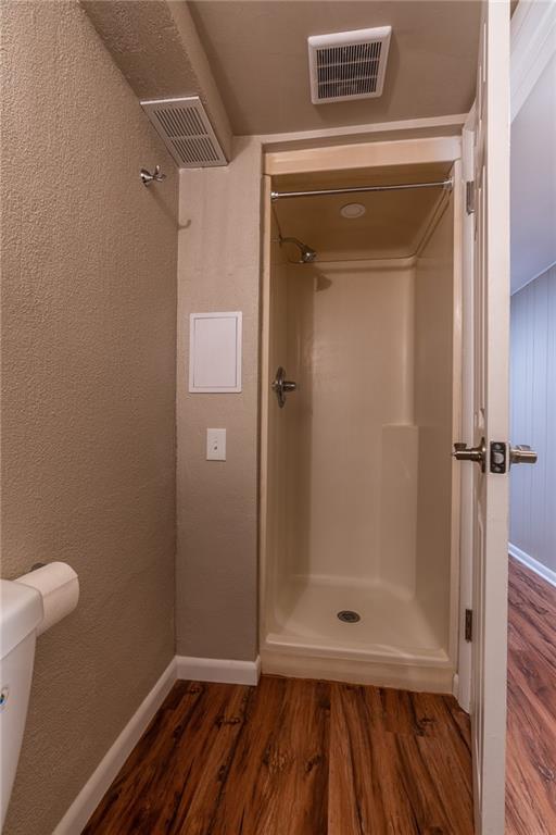 562 Filmore Road Pittsburgh, PA 15221 - Photo 22 of 25 a bathroom with a glass door shower