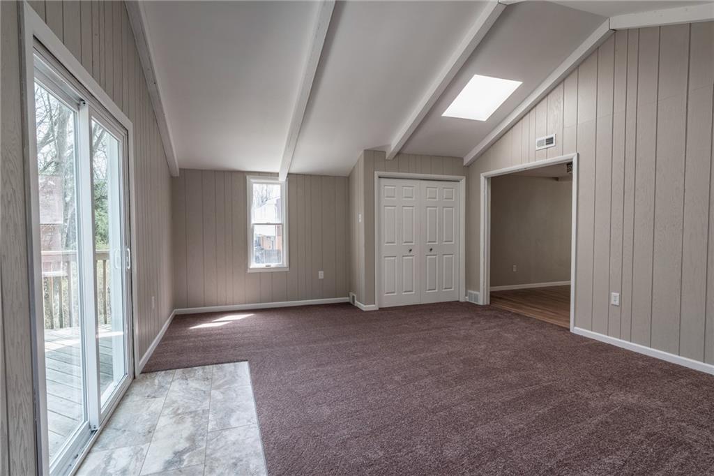 562 Filmore Road Pittsburgh, PA 15221 - Photo 9 of 25 an empty room with windows and closet