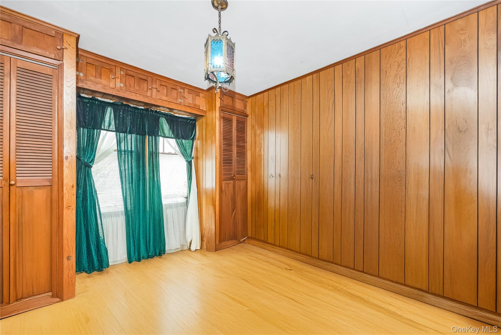 24 Bay 3rd Street Islip, NY 11751 - Photo 11 of 27 a view of a big room with a chandelier