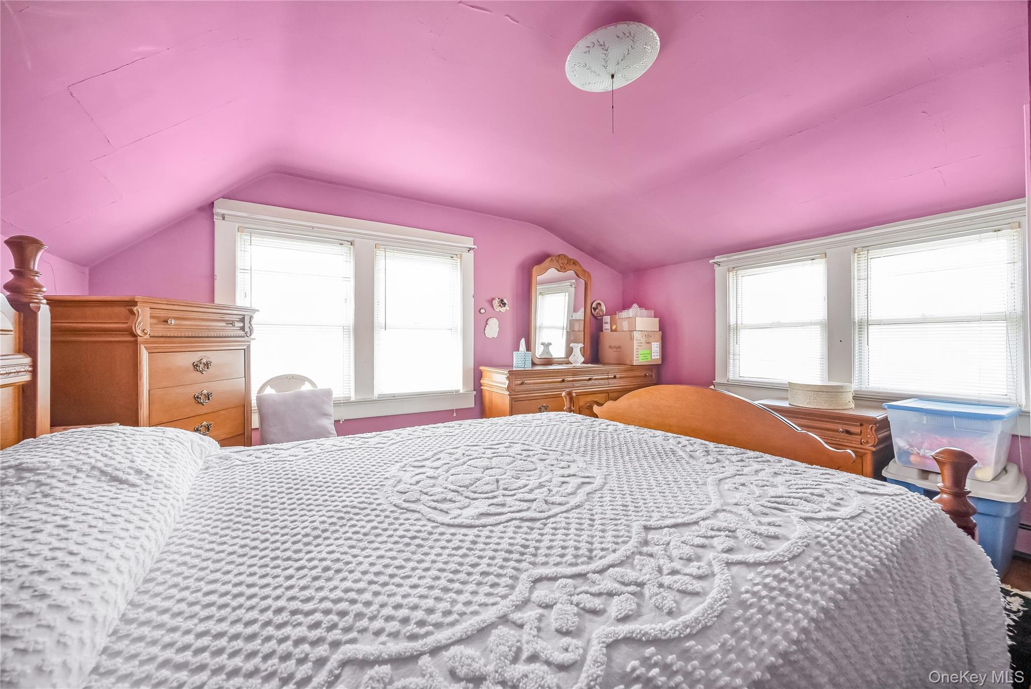24 Bay 3rd Street Islip, NY 11751 - Photo 14 of 27 a bedroom with a bed and a window