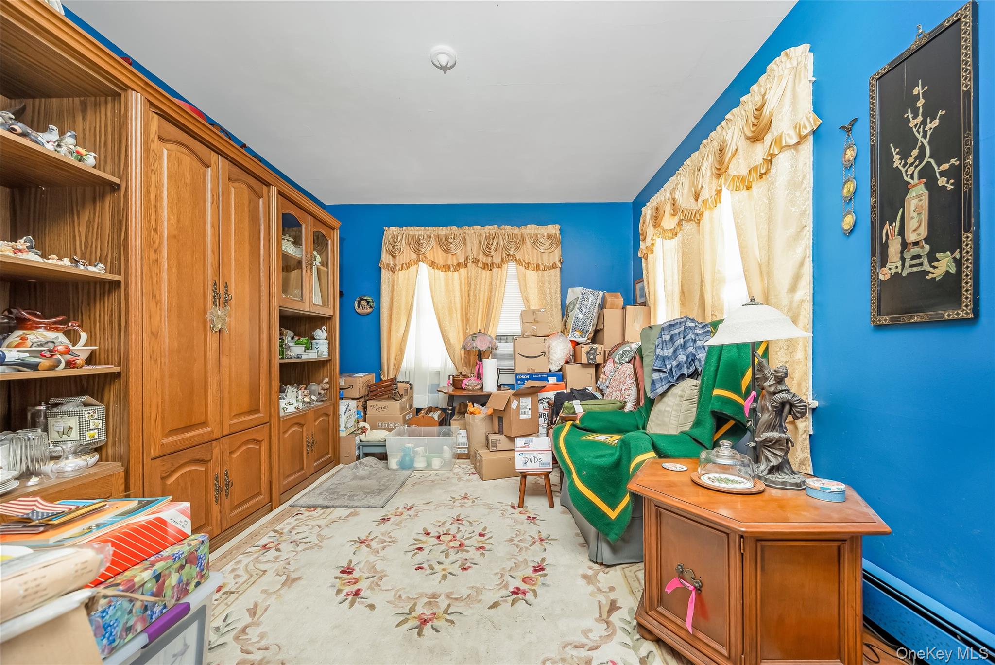 24 Bay 3rd Street Islip, NY 11751 - Photo 19 of 27 a living room with furniture and a large window
