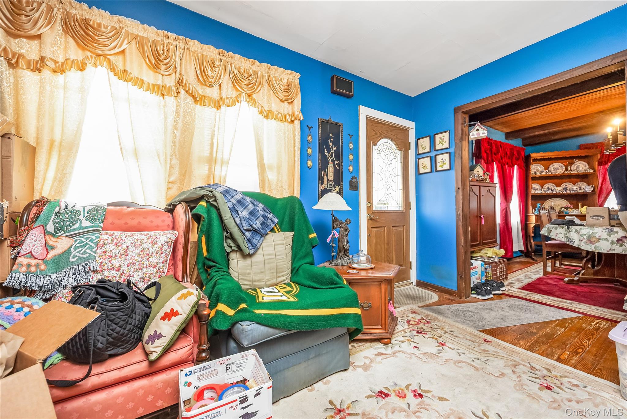 24 Bay 3rd Street Islip, NY 11751 - Photo 20 of 27 a living room filled with furniture and a table